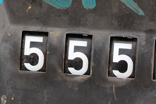 Number 555 On Old Rusty Counter Of Fuel Pump