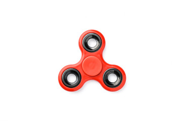 red fidget spinner on white background