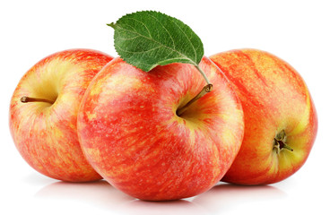 Group of ripe red yellow apples with green leaf isolated on white background