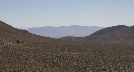 Road through desert and mountains