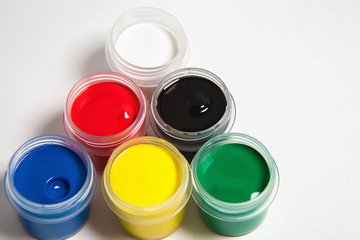 jars of gouache in the form of a semicircle or rainbow of gouache