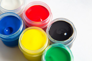 jars of gouache in the form of a semicircle or rainbow of gouache