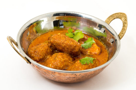 Malai Kofta or meatballs - Traditional Indian food  served in a brass utensil