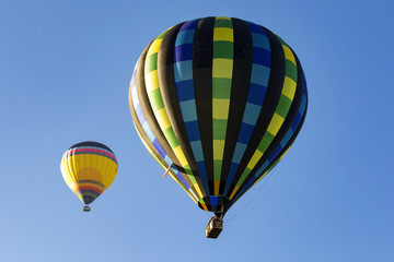 Balloons flying above California grape vineyard