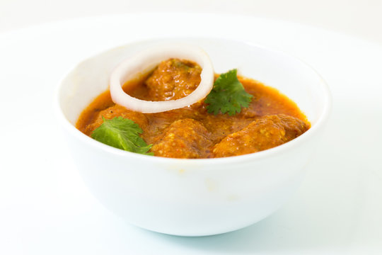 Malai Kofta or meatballs - Traditional Indian food  served in white bowl of bonechina