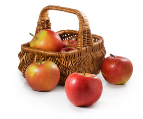 Isolated image of ripe apples in the basket closeup