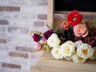 Roses on wooden chairs