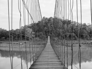 Fototapety  Wood Bridge with Rope in Thailand (Black and White)