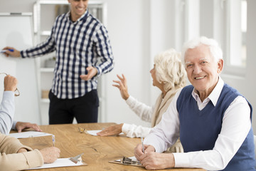 Grandpa smiling during IT classes