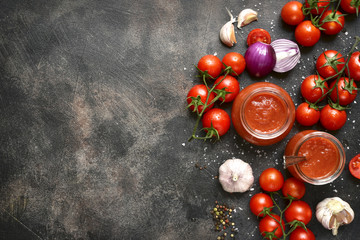 Homemade tomato sauce with ingredients for making.Top view with copy space.