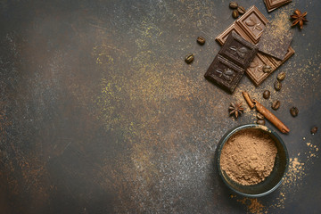 Milk and bitter chocolate with cocoa and spices.Top view with copy space.
