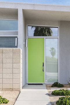 vertical shot of a lime green front door