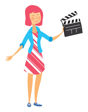 Young woman holding a clapperboard