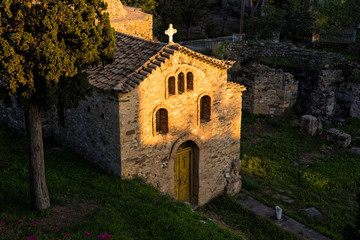 Fototapeta na wymiar Old Byzantine church at sunset in the town of Koroni in Peloponnese, Greece