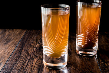 Demirhindi serbeti or sherbet / Tamarind Juice on dark wooden surface.