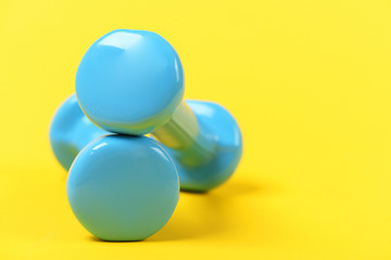 Dumbbells made of plastic in blue color