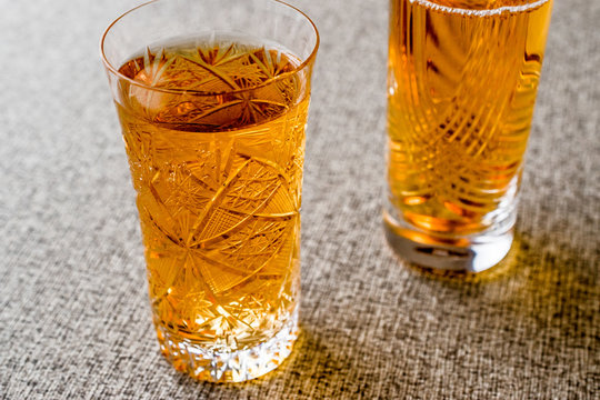 Safran or Koruk serbeti / Saffron Sherbet on grey surface..