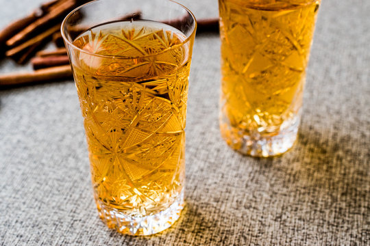 Safran or Koruk serbeti / Saffron Sherbet with cinnamon sticks.