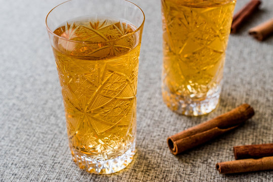 Safran or Koruk serbeti / Saffron Sherbet with cinnamon sticks.