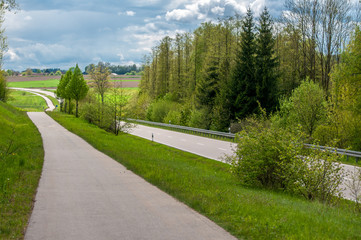 An empty road in the summer time. Image has a vintage effect.