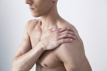 Naklejka premium Shoulder pain in a man