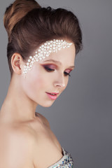 Fashion Model with Creative Makeup. Young Woman with Colorful Make up