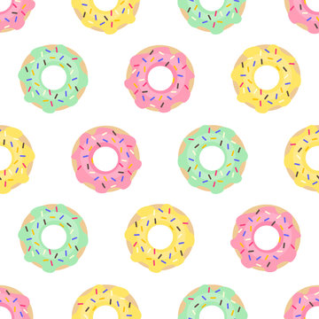 Donuts seamless pattern on white background. Cute sweet food baby background. Colorful design for textile, wallpaper, fabric, decor.