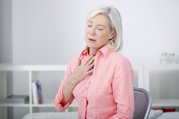 Senior woman with breathing difficulties