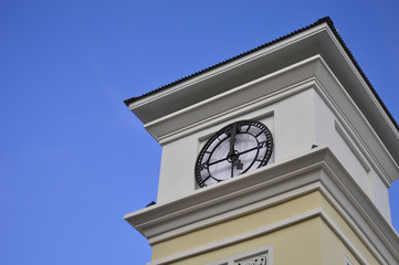 Close up clock tower Modern style, blue sky background