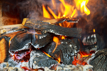 Burning fireplace. Fireplace as a piece