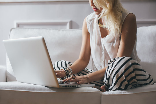 Woman Blogging At Home