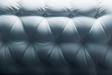 white and dark leather Texture Sofa backrest. Modern bedroom furniture.