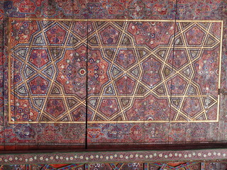 blue and white traditional uzbek tiles / mosaic from Khan (king)  Palace in Khiva, Uzbekistan	Detail of a blue mosaic with geometric shapes in Khan Palace of Khiva