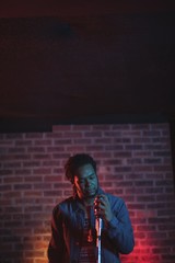 Male singer performing in nightclub