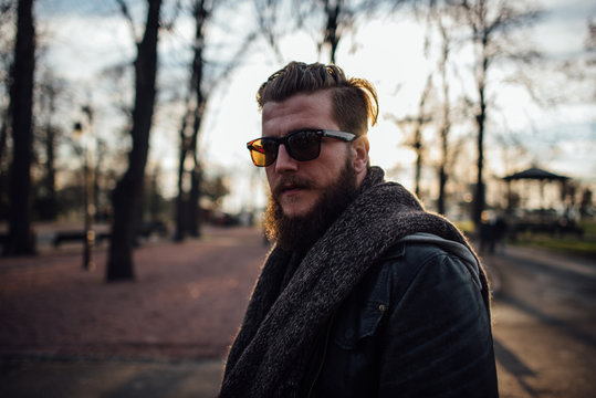 Portrait of stylish bearded man in the city