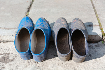 Rural footwear. Golosha and slippers dry.