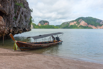 Longtail boat on the shore of James Bond Island in Thailand