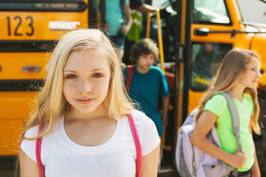 School Bus Pretty Female Student After Getting Off Of Bus