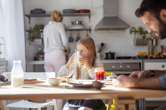 Family Having Breakfast Together