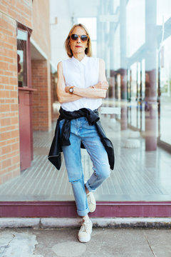 Portrait of a stylish mature woman on the street