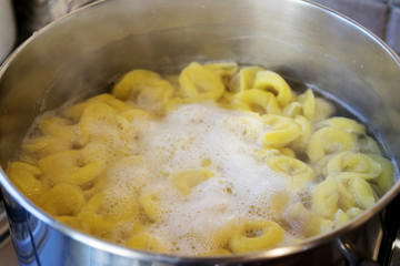 tortellini cooking in boiling water