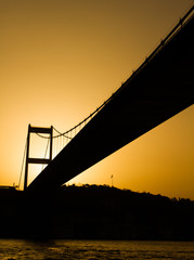 Bridge over the strait of the bosphorus, sunset. Contour, sepia