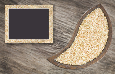 Amaranth seeds on the wooden table (Amaranthus)