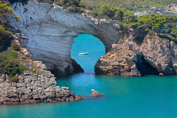San Felice bay with is natural arch (Architello) on Vieste coast, Gargano, Apulia, Italy