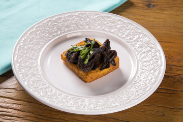 Traditional fried polenta with shitake