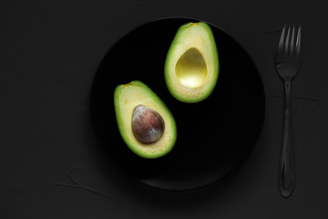 avocado halves on a plate