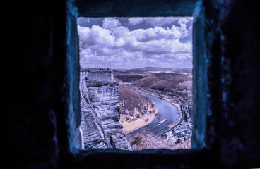 castle wall with tower at  Koenigstein Fortress, infrared photo