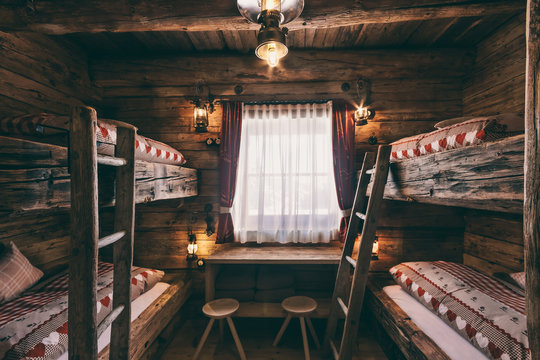 four bed room with rustic wooden bunk beds