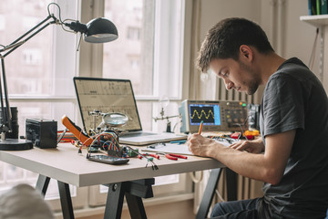 Engineer Testing Equipment at Home