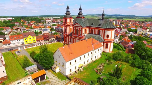 Church of The Assumption (1775) in small town Prestice. Architecture from above. Rare baroque monument in Czech Republic, Central Europe. 